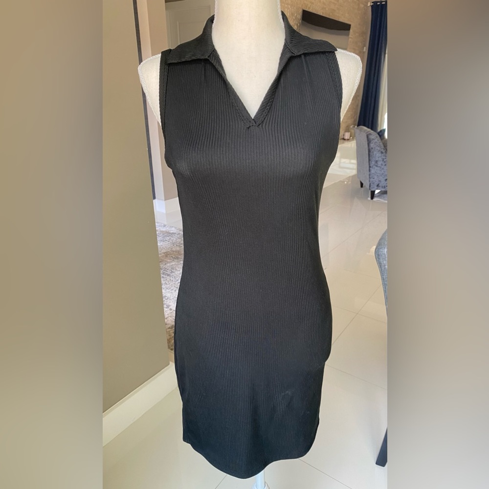 Black casual dress, in between midi and mini